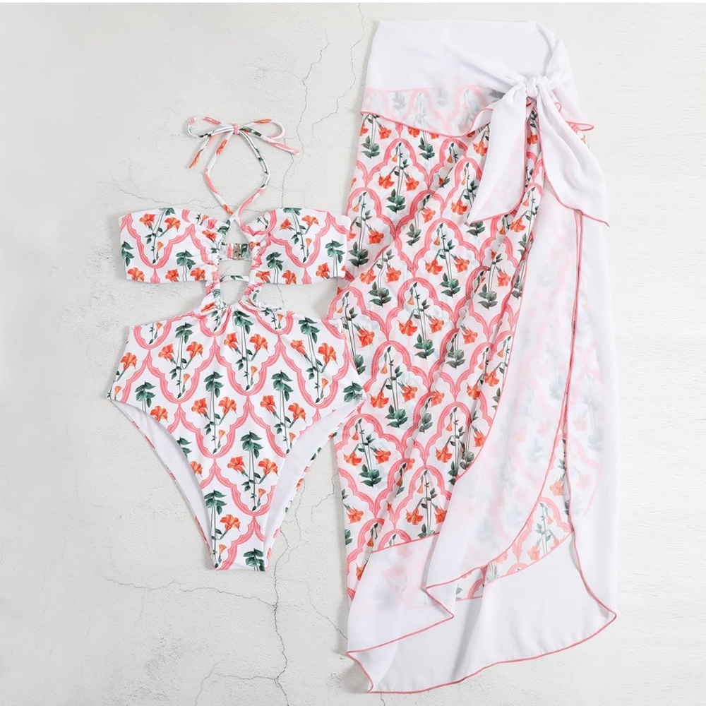 Women’s one piece swimsuit with matching cover up skirt